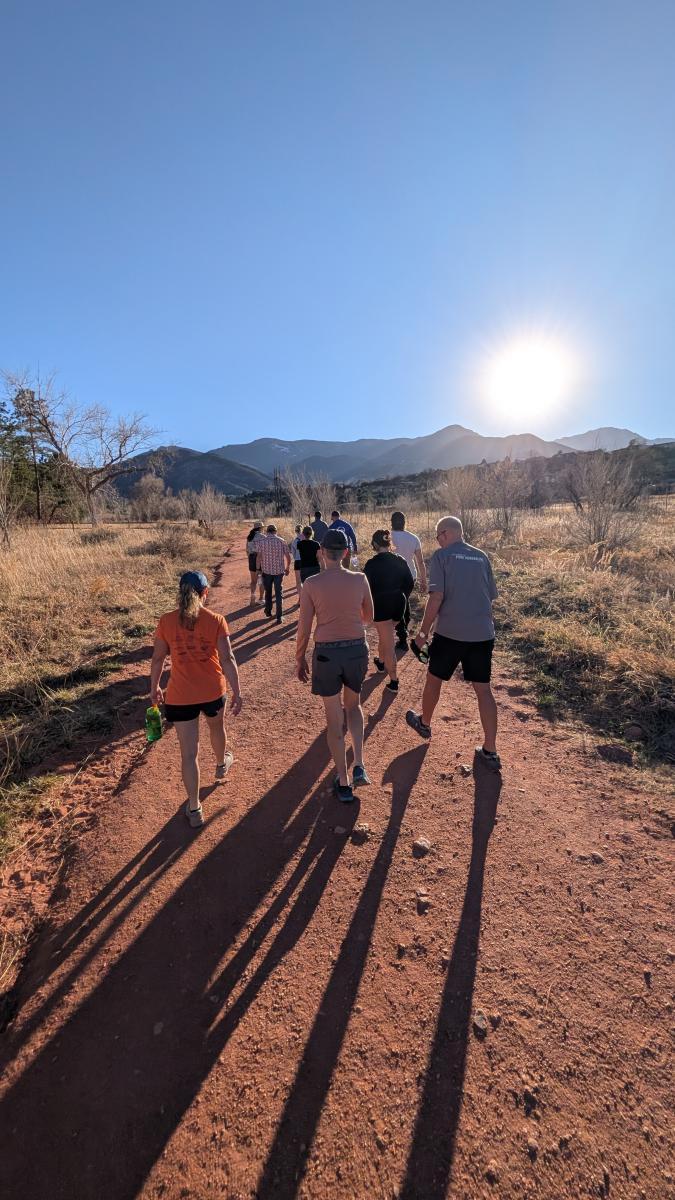 hikers in red rock canyon