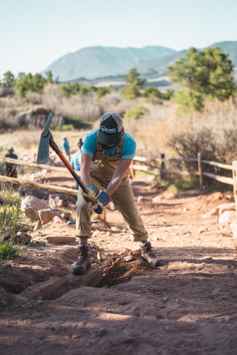 RMFI Staff using a pickmattock